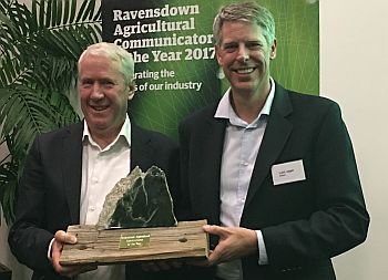 Ravensdowns Mike Manning (left) presented the trophy to Lain Jager.